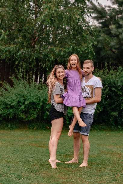istock A child with births have fun in nature barefoot. 1392501112