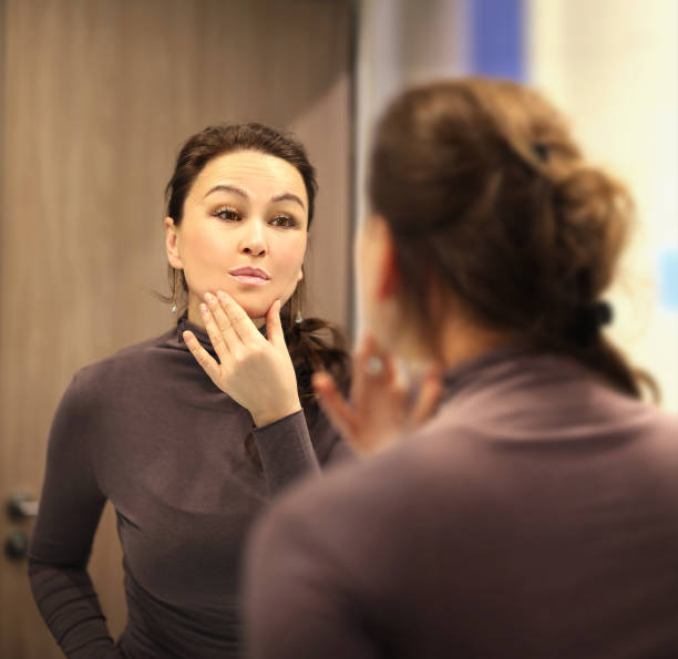 istock Magic anti-aging cream.Applying the cream. 1392502879