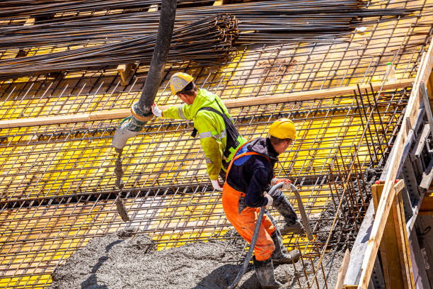 istock Concrete pouring on the construction site. 1392505727