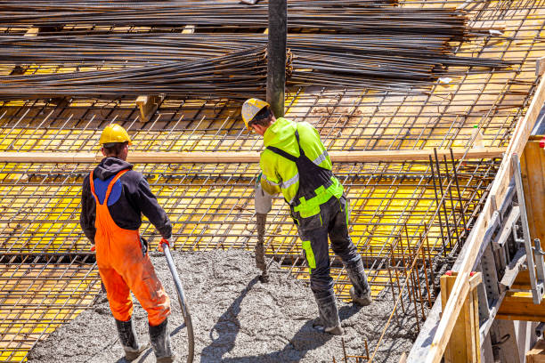 istock Concrete pouring on the construction site. 1392505756