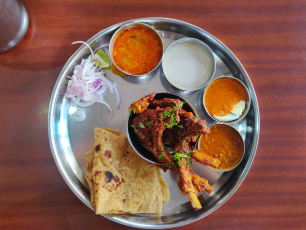 istock Lamb chops thali served with gravy, Curd and Chapati, India 1392506052
