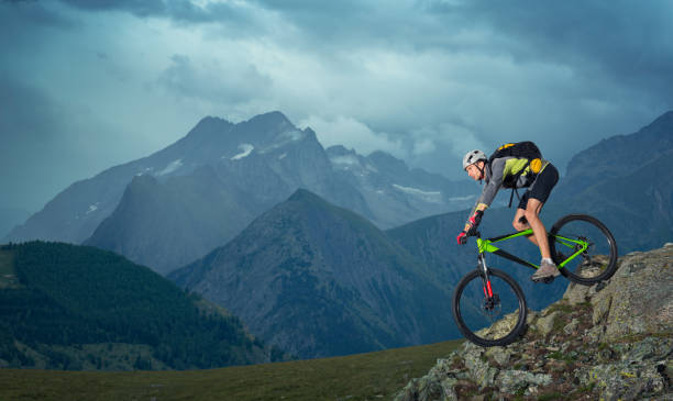 Male mountain biker rides down mountain trail, Martin, Fatra Mountains