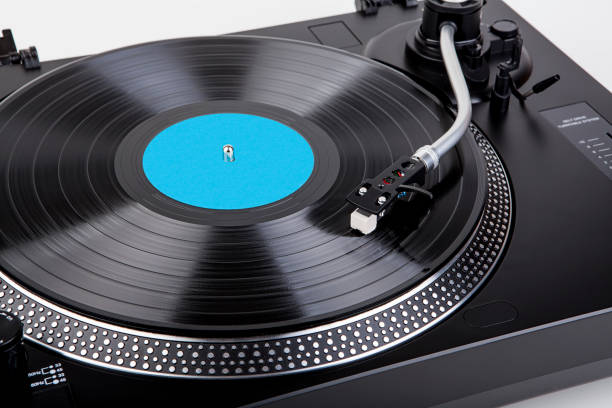 istock Classic and analog turntable for playing vinyl records. Model for a DJ 1392507638
