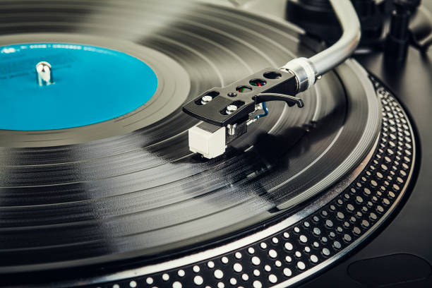 istock Classic and analog turntable for playing vinyl records. Model for a DJ 1392507642