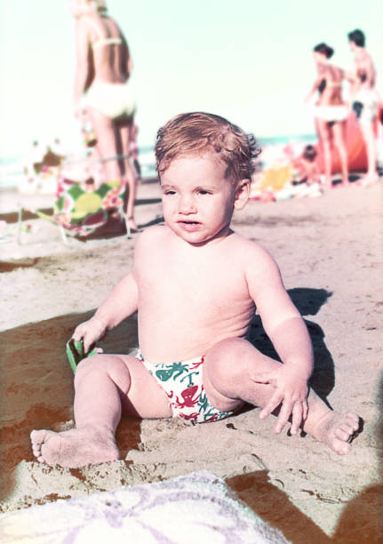 istock Vintage baby at the beach 1392510611