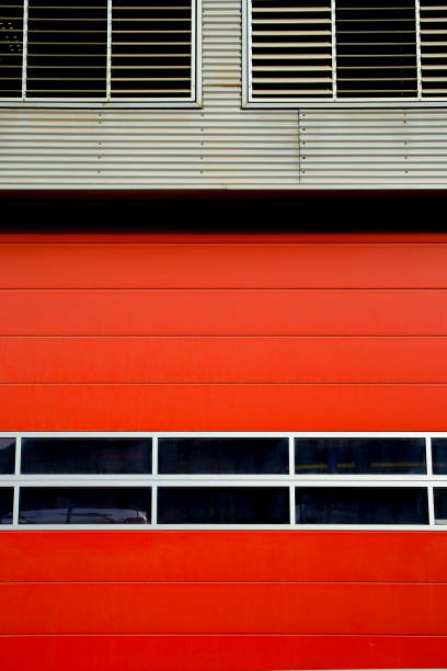 istock Red garage door with glazed window 1392511001