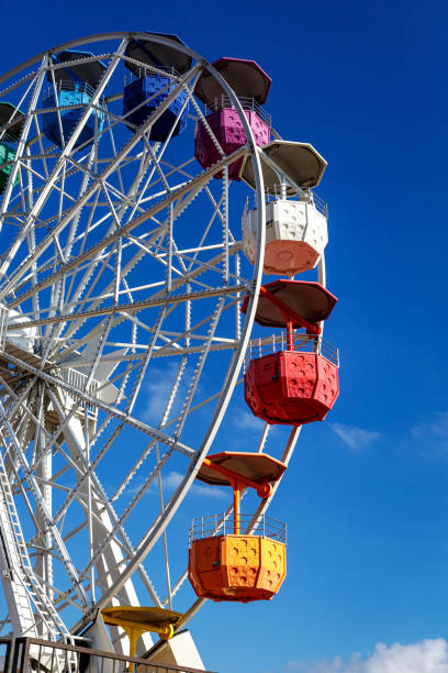 istock Ferris Wheel Over Blue Sky. 1392513605