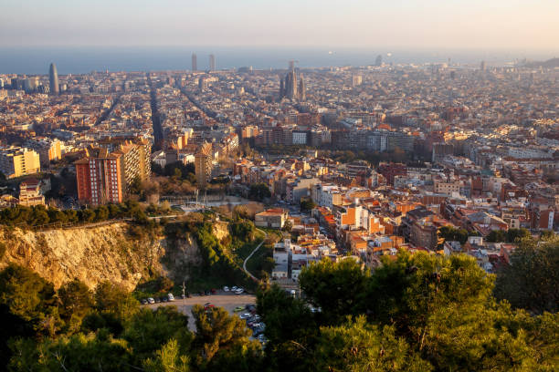 istock Barcelona city panorama during sunset 1392513716
