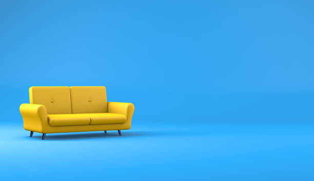 istock Empty modern and minimalist yellow sofa with blank space 1392515124