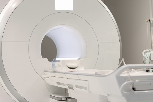 MRI magnetic resonance imaging device in hospital. Medical equipment and healthcare
