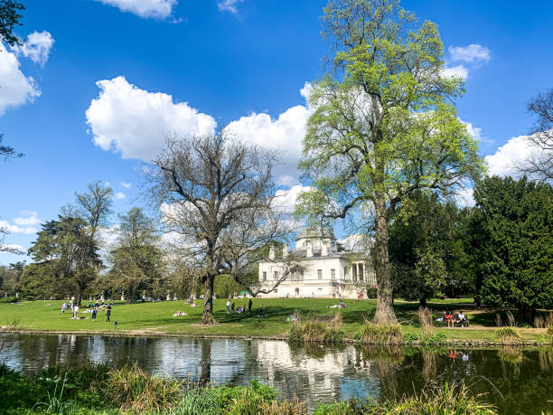 Chiswick House and Gardens view. Pond Fragment of facade of Chiswick House and gardens - 18th century mansion in West London. Free access to the garden. Baroque style villa in Chiswick, London. View from other coast of pond. chiswick stock pictures, royalty-free photos & images