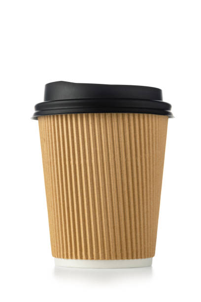 istock Close up of disposable coffee cup with lid on white 1392523992