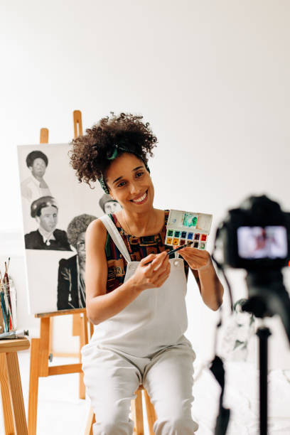 istock Blogger live streaming her art studio 1392525091
