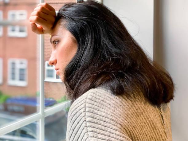 istock Young candid millennial woman is depressed and anxious 1392525207