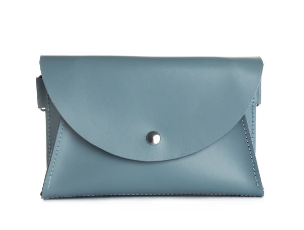 istock Light blue women's envelope belt bag isolated on white 1392526043