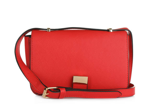 istock Red women's leather flap bag isolated on white 1392526644