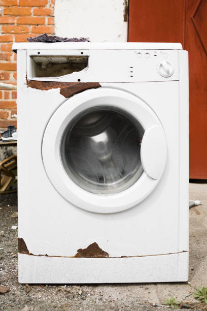 istock old used washing machine  with rysty metal elements 1392529505