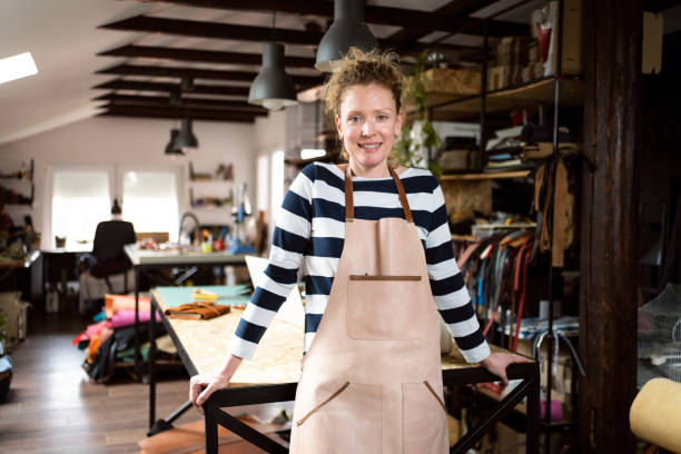 istock Confident Caucasian female tailor at the workshop 1392530134