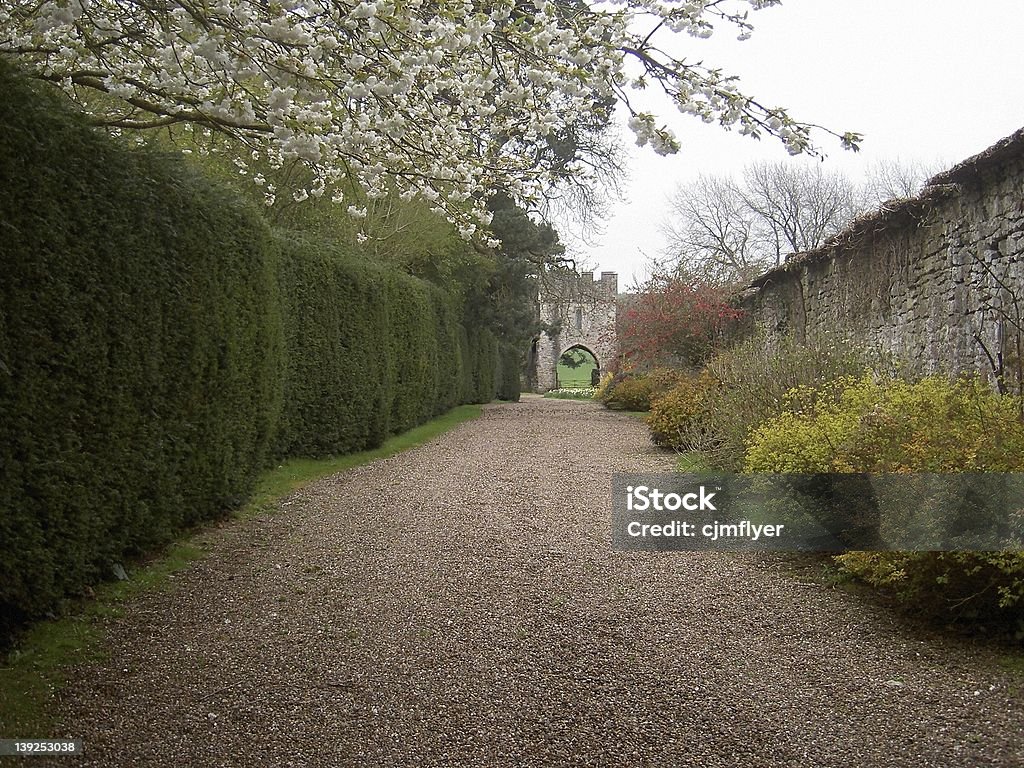 Up the Garden Path view along walled and secluded garden path Arch - Architectural Feature Stock Photo