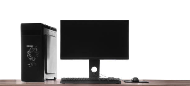 istock Modern computer with blank monitor screen and peripherals on wooden table against white background 1392531413