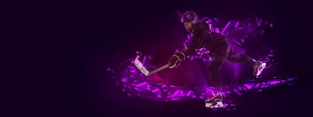 istock Young man, professional hockey player in protective uniform training isolated on dark background polygonal, fluid neon elements. Concept of sport 1392532834