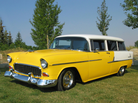 Yellow and white Chevrolet Nomad 1950's