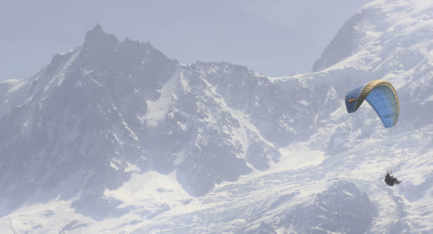 istock Paraglider in front of the Aiguille du Midi 1392534549