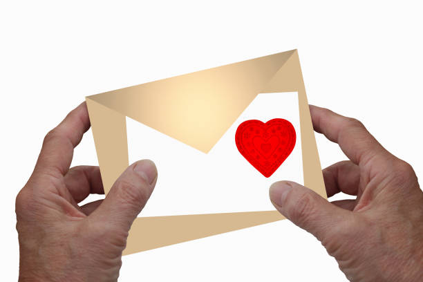 istock Hands holding a valentines day postcard 1392535460