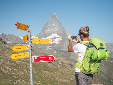 Stelvio mountain pass or Stilfser Joch scenic road serpentines panoramic view, border of Italy and Switzerland