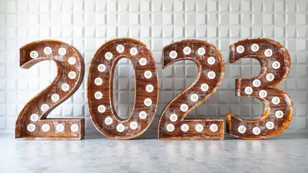 istock 2023 Bulb Sign Against White Wall 1392543180