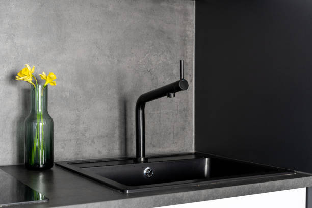 istock Black sink in contemporary kitchen interior design 1392545316