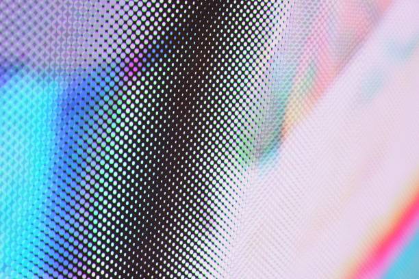 istock Close-up of Led screen surface video wall screen with glowing dot lights background 1392546084