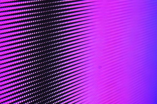 Close-up of Led screen surface video wall screen with glowing dot lights background