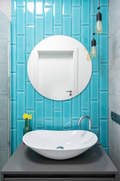 istock White sink in colorful bathroom after renovation 1392547106