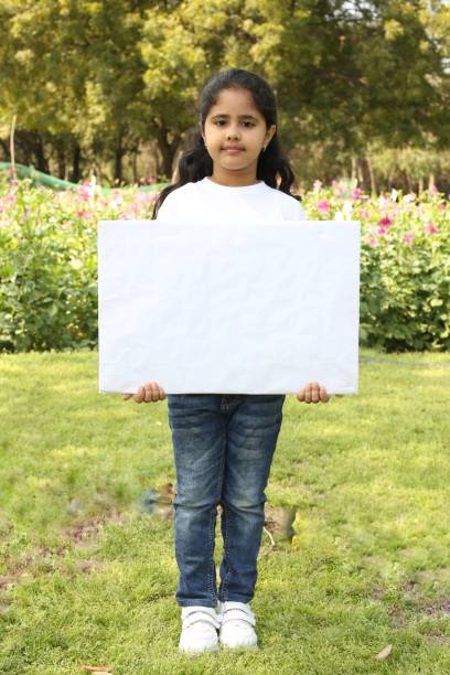 istock Kids volunteer charity environment 1392547215