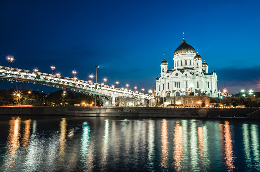Moskva River And Bridge Leading To Christ The Savior Church At Night In Moscow, Russia