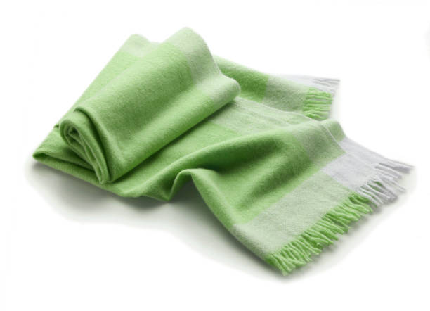 istock green soft cashmere wool scarf resting on a white surface 1392548153