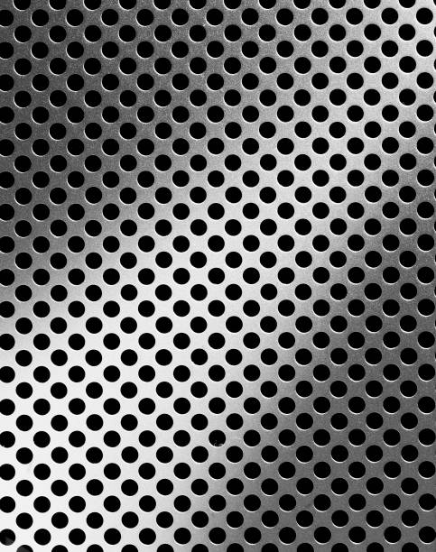 istock perforated metal plate with diagonal gradient of light 1392548532