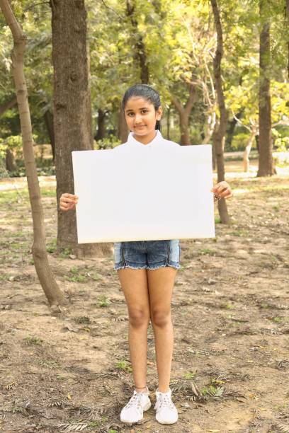 istock Kids volunteer charity environment 1392548756