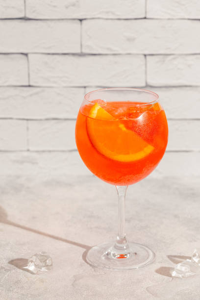 istock Glass of cold Spritz cocktail. 1392549796