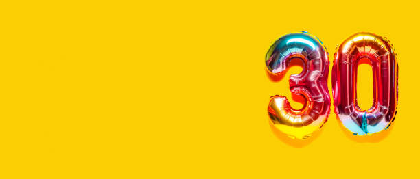 istock Rainbow foil balloon number. Top view. 1392550022