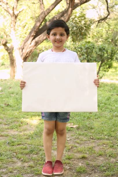 istock Kids volunteer charity environment 1392550077