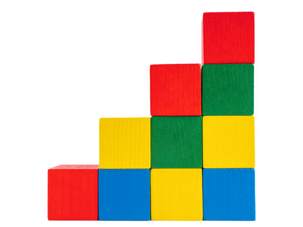 istock Wooden building blocks isolated on white background 1392550375