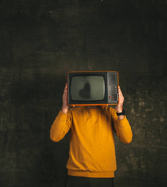 istock The guy holding a TV. Channel happy thoughts, 1392550973