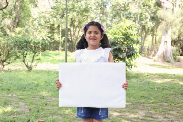 istock Kids volunteer charity environment 1392551192