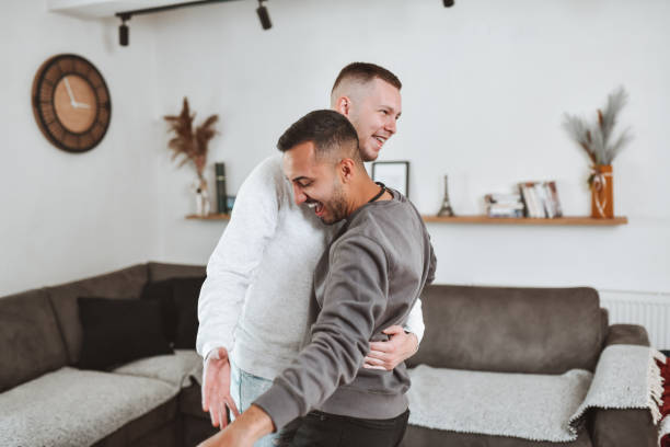 istock Gay Males Dancing Together At Home 1392551268