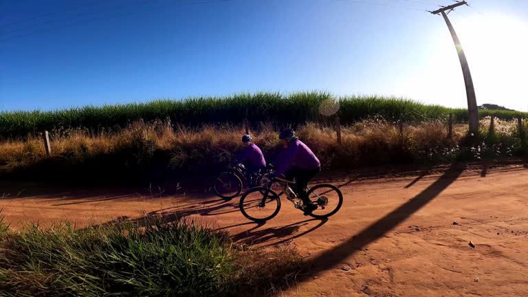 senior couple riding a bicycle