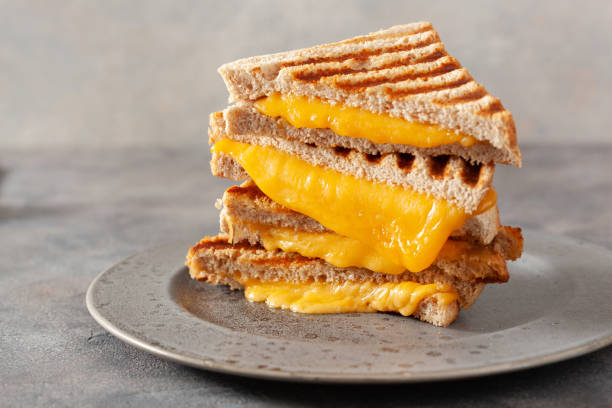 istock grilled cheese sandwich on gray concrete background 1392553109