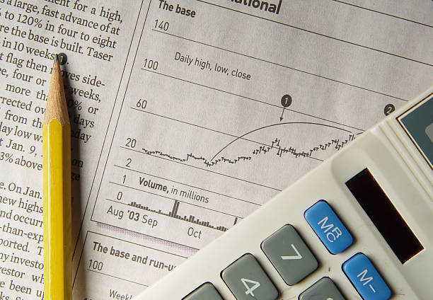 istock Newspaper WIth Pencil and Calculator 139255507