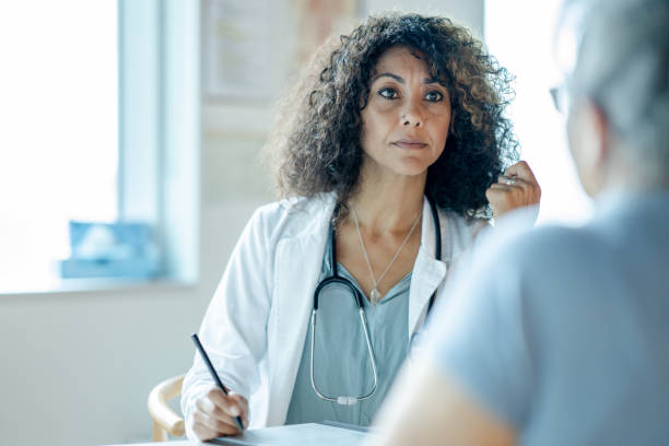 istock Meeting with a Senior Patient 1392555747